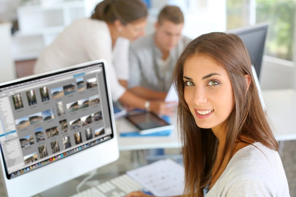 Female student in front of her computer looking for an internship