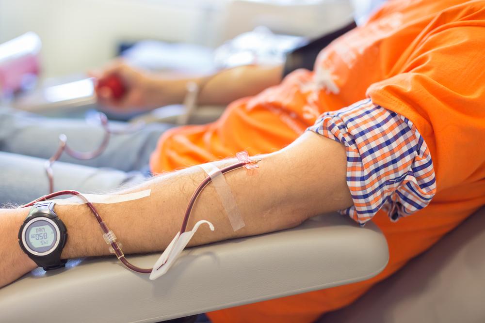 Person donating blood at a medical centre